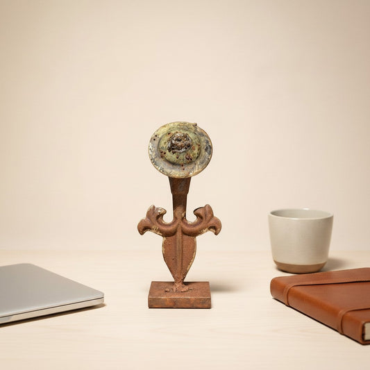 Metal Morph Sculpture handcrafted steel finial art piece featuring a reclaimed metal bloom on a desk setting.