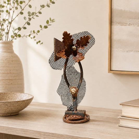 Metal Morph Sculpture handcrafted steel botanical art made from reclaimed mesh and metal on a wooden shelf
