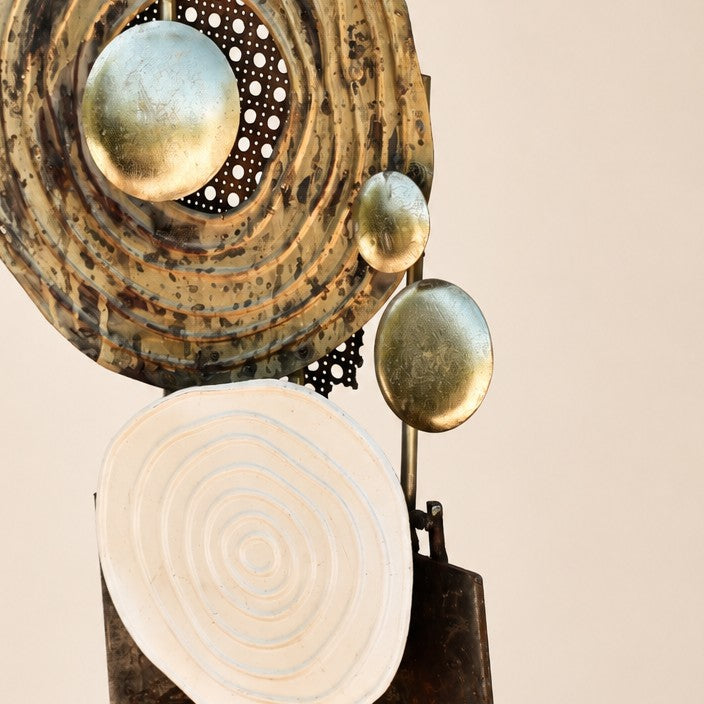 Metal Morph Sculpture Madame Orbit handcrafted architectural metal art featuring layered gold spheres and white discs.