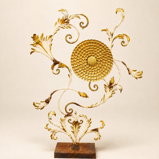 Metal Morph Sculpture The Gilded Wild freestanding metal art with gold acanthus leaves and a central golden bloom.