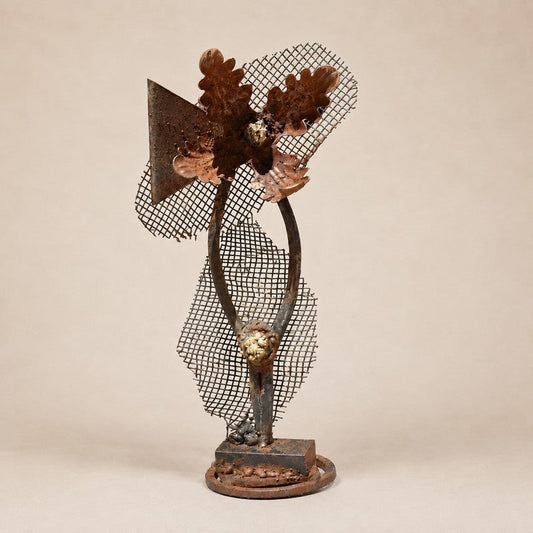 Metal Morph Sculpture handcrafted steel botanical art featuring salvaged mesh, industrial textures, and floral details.