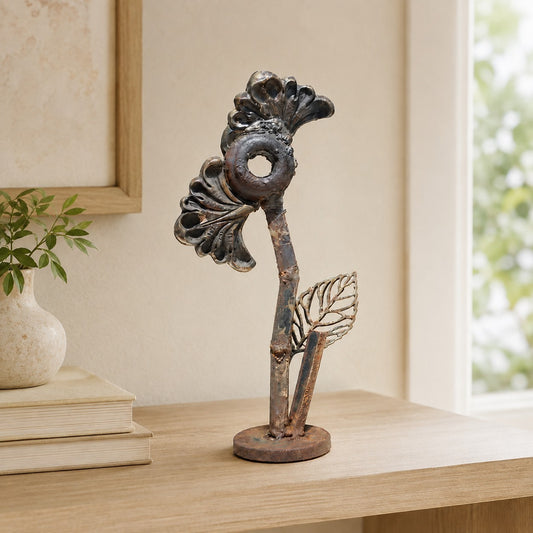 Metal Morph Sculpture Little Bloom handcrafted steel flower sculpture with salvaged fan-shaped petals on a desk.