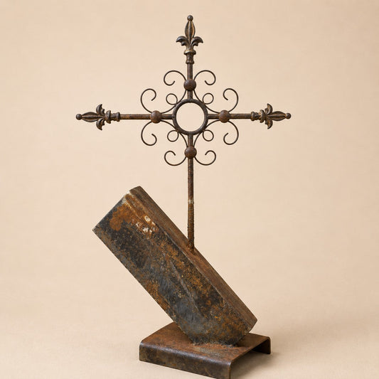 Metal Morph Sculpture The Iron Summit handcrafted steel cross sculpture with a natural rust patina on a metal base.