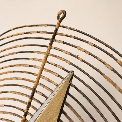 Metal Morph Sculpture Starbound kinetic floor sculpture detail featuring a rustic vintage metal ventilation wheel