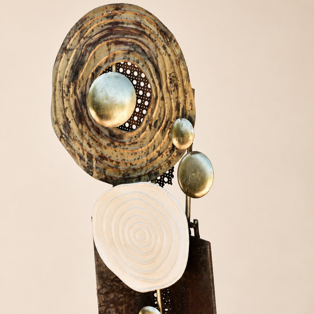 Metal Morph Sculpture Madame Orbit handcrafted architectural floor sculpture with metallic orbs and weathered steel.