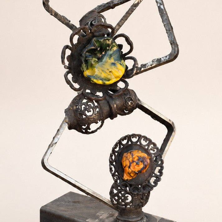 Metal Morph Sculpture Molten Geometry mixed-media steel and glass flower sculpture with vintage cast-iron details