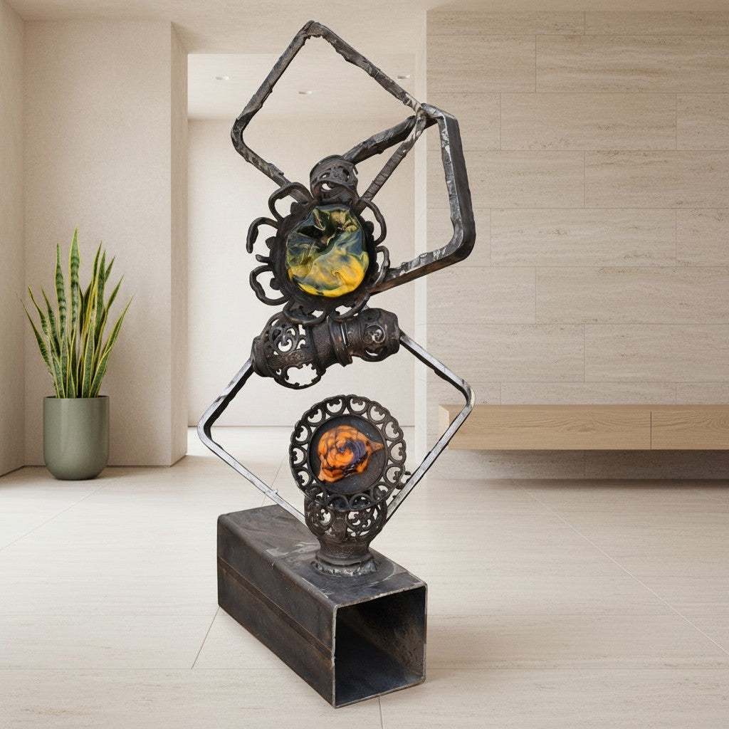 Metal Morph Sculpture Molten Geometry mixed-media art featuring raw steel frames and colorful handmade glass flowers.