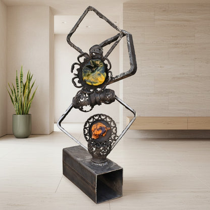 Metal Morph Sculpture Molten Geometry mixed-media art featuring raw steel frames and colorful handmade glass flowers.