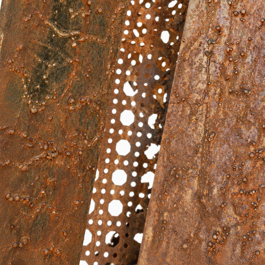 Metal Morph Sculpture Madame Orbit featuring weathered raw steel panels and industrial metal mesh texture detail