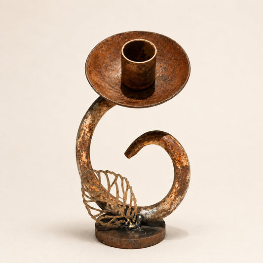 Metal Morph Sculpture handcrafted reclaimed steel flower candle holder with a rustic patina and welded leaf detail.