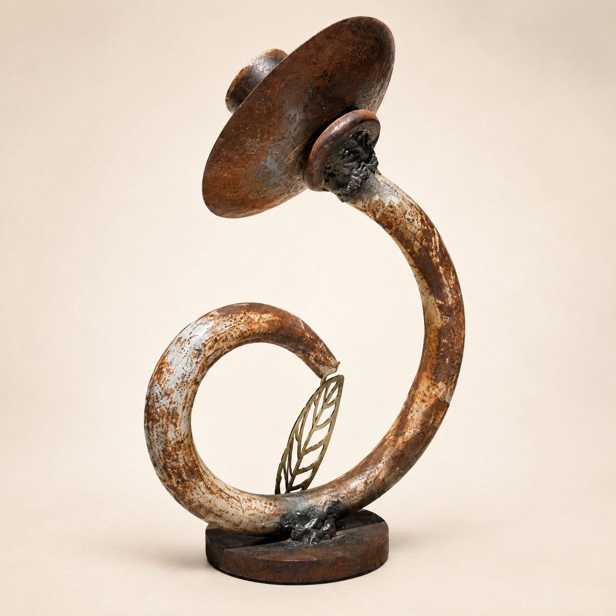Metal Morph Sculpture The Unlikely Flower handcrafted reclaimed metal art piece with a rustic patina and leaf detail.