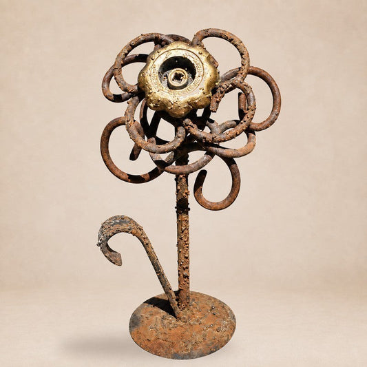 Metal Morph Sculpture Valve Bloom handcrafted floral art made from reclaimed steel and a brass valve on a round base.
