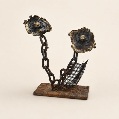 Metal Morph Sculpture Chain Gang Blooms handcrafted floral art made from salvaged steel chain and fireplace mesh