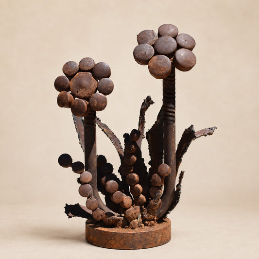 Metal Morph Sculpture Iron Bloom Duo handcrafted from reclaimed steel with a natural rust patina on a circular base.