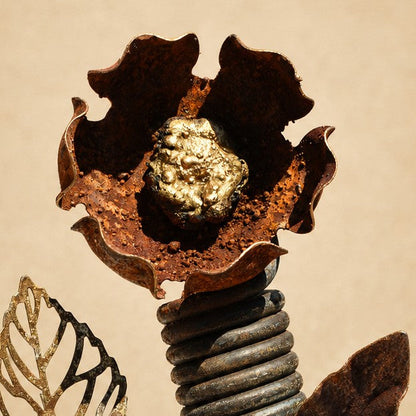 Metal Morph Sculpture Spring Bloom handcrafted steel flower with rust patina and gold weld-bead center on spring stem