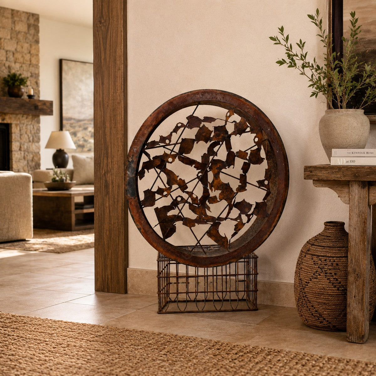 Metal Morph Sculpture Rust & Radius circular steel art piece with a rusted patina, displayed on a vintage milk crate.