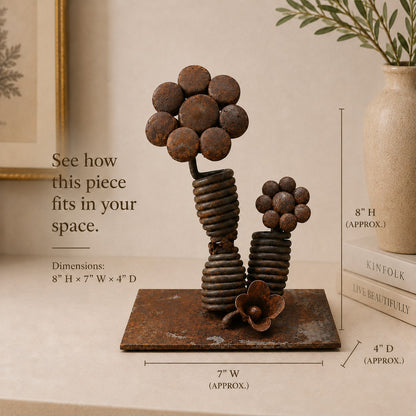 Metal Morph Sculpture Double Spring Bloom handcrafted steel floral art with reclaimed coil springs on a steel base.