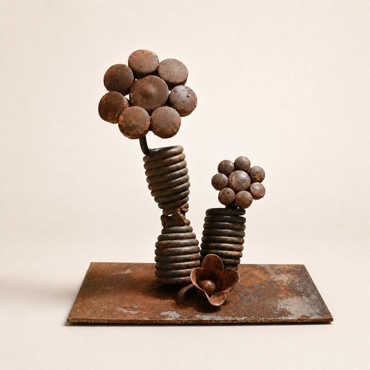 Metal Morph Sculpture Double Spring Bloom handcrafted steel floral art with reclaimed coil springs and welded petals.
