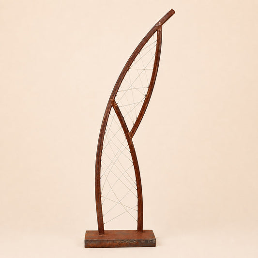 Metal Morph Sculpture Steel Lattice Arc featuring a curved rusted metal frame with intricate wire mesh detailing.