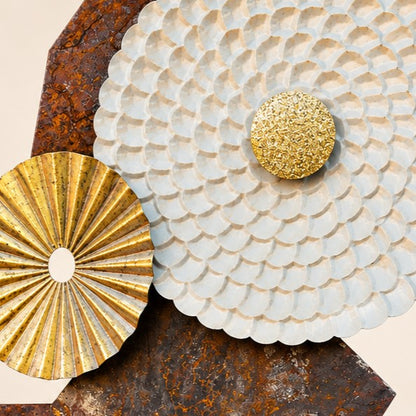 Metal Morph Sculpture Zig Zag Sun featuring a textured white metal sun and gold accents against rustic steel plates.